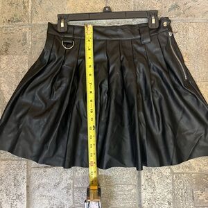 Black faux leather pleated skirt
